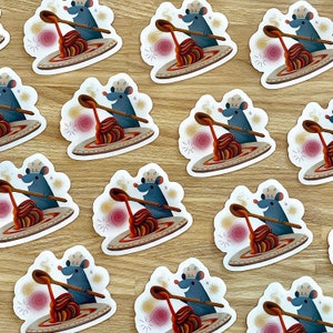 May include: A set of 10 colorful stickers featuring a cartoon mouse chef stirring a pot of spaghetti. Each sticker has a different background color and a unique design.