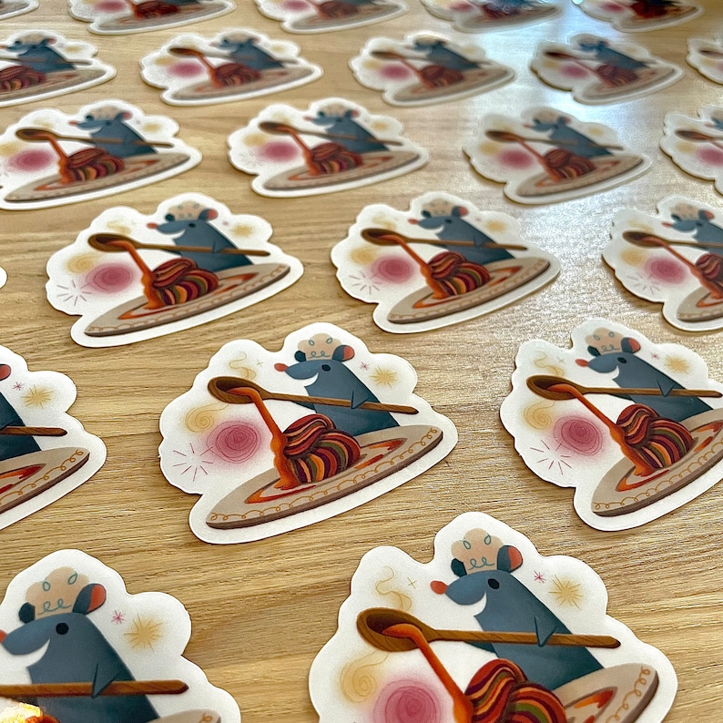 May include: A set of 10 stickers featuring a cartoon mouse wearing a chef's hat and holding a spoon over a bowl of spaghetti. The stickers are printed on white, glossy paper and have a rounded rectangular shape.