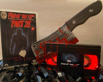 Deluxe Friday 13th Part 3 Retro VHS Lamp. Perfect as a special gift for lovers of horror films and gore.