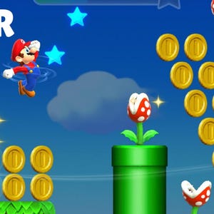 May include: A vibrant illustration featuring characters from the Super Mario video game series. Mario is jumping, surrounded by stars, with coins and green pipes. The word "TANNER" is displayed at the top in white letters. Other characters include Luigi, Princess Peach, and others.
