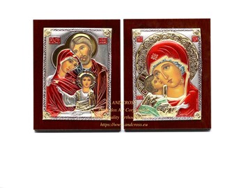 May include: Two small, framed, religious icons with gold and silver accents. The icons depict the Holy Family and the Virgin Mary and Child. The frames are made of dark wood.