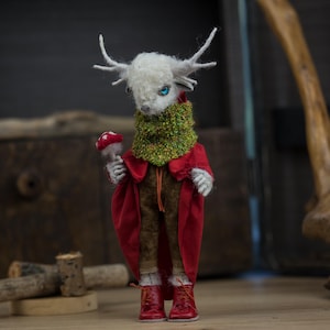 Art doll deer with fly agaric