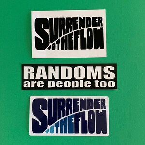 May include: Three stickers with text on a green background. The top sticker is white with the words "SURRENDER TO THE FLOW" in black. The middle sticker is black with the words "RANDOMS are people too" in white. The bottom sticker is white with the words "SURRENDER TO THE FLOW" in blue.
