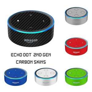 May include: A set of six different colored skins for the Amazon Echo Dot 2nd generation. The skins are in black, gray, red, blue, white, and green. The skins are all made of a carbon fiber material. The skins are all labeled with the Amazon logo.