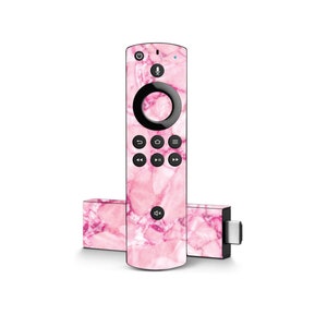 May include: Pink marble skin for an Amazon Fire TV Stick 4K and its remote control. The skin features a pink and white marble pattern.