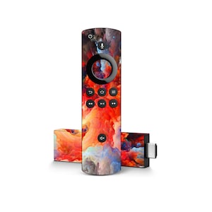 May include: A black streaming device with a colorful abstract design. The device is about the size of a small phone and has a HDMI port on the side. The remote control is also black with the same colorful abstract design. The remote has buttons for power, home, back, play/pause, volume up/down, and a microphone.