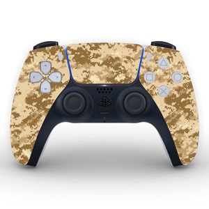 May include: A black and white camouflage patterned PlayStation 5 DualSense wireless controller.