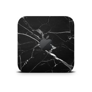 May include: Black marble skin decal for Apple devices. The decal features a white marble pattern on a black background.