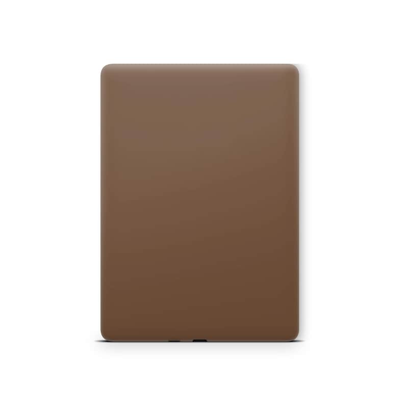 K&ouml;nnte beinhalten: Ein brauner, rechteckiger E-Reader mit matter Oberfl&auml;che.