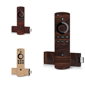 May include: A set of three Amazon Fire TV Stick 4K streaming devices with a wood grain design. The devices are shown with their remote controls. The remote controls have a wood grain design and feature a circular navigation button.