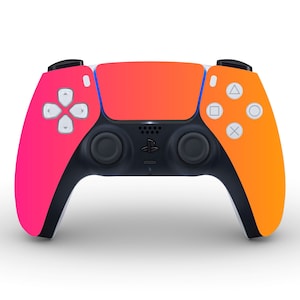 May include: A pink and orange PlayStation 5 DualSense wireless controller with a black faceplate and white buttons.