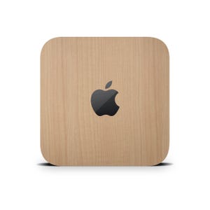 May include: A square-shaped, light brown wooden box with a black Apple logo in the centre.