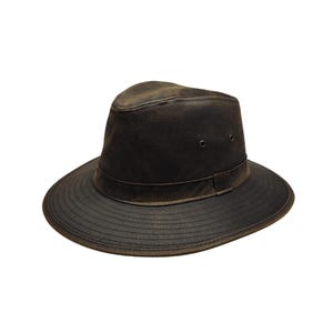 May include: A dark brown leather hat with a wide brim and a slightly indented crown. The hat features a band around the base of the crown and two small eyelets on the side. The leather has a distressed, weathered appearance.
