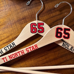 Jersey Hangers. Personalized Hangers for Sports Jerseys and Uniforms.