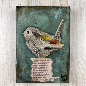 May include: Mixed media artwork featuring a textured bird with gray, yellow, and red accents on a teal background. The artwork includes text from Philippians 4:8 and a strip that reads "HAPPY THOUGHTS."