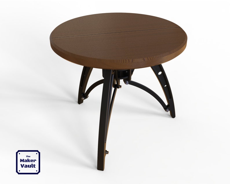May include: A round wooden table with a dark brown top and a black metal base. The base has a unique design with curved legs and metal accents.