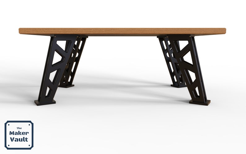 Puede incluir: Una mesa de madera con una tapa rectangular y cuatro patas de metal negro. Las patas est&aacute;n dise&ntilde;adas con un patr&oacute;n geom&eacute;trico.