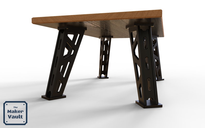 Puede incluir: Una mesa de madera con cuatro patas de metal negro. Las patas tienen un dise&ntilde;o geom&eacute;trico y est&aacute;n unidas a la parte inferior de la superficie de la mesa.