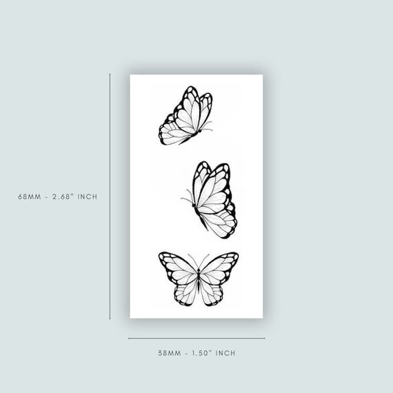 tiny flying butterfly tattoo design   Butterfly tattoo Butterfly tattoo  designs Tattoos