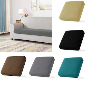 May include: Set of 6 square seat cushions in various colours, including beige, black, brown, grey, and teal. The cushions are made of a soft, textured fabric and are perfect for adding a touch of colour and comfort to any chair or sofa.