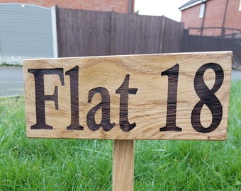 Personalised Oak garden signs with a 25cm ground stake attached