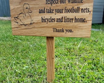 Personalised Oak garden signs with a 25cm ground stake attached