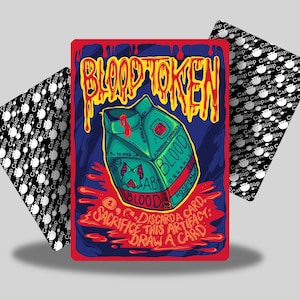May include: A fantasy-themed card with the text "BLOOD TOKEN" in yellow and red. The card features a green and blue blood container with the words "AB BLOOD ORGANIC HOSPITAL". Two additional cards with a repeating cat pattern are on either side.