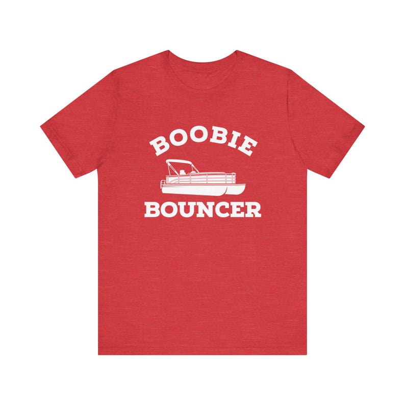 May include: Red heather t-shirt with white text that reads "Boobie Bouncer" and a white silhouette of a pontoon boat.
