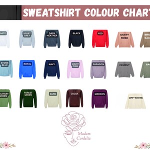 The image is a color chart displaying various color options for a sweatshirt, including white, sport grey, dark grey, black, red, brown, dusty rose, navy, light pink, light grey, forest green, sand, cocon, maroon, and off white.