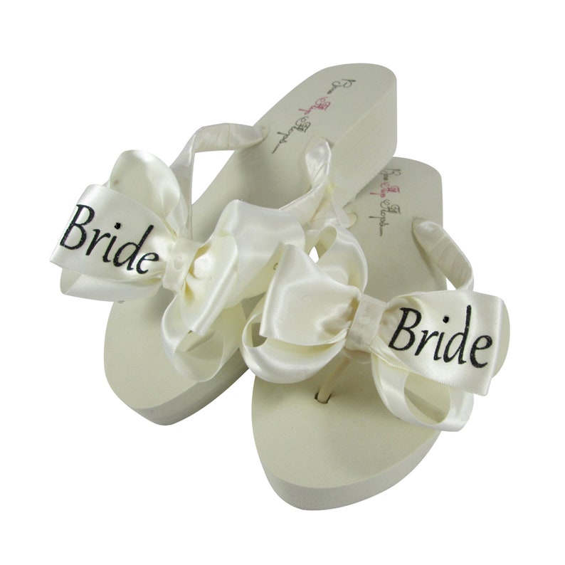 glitter bow flip flops