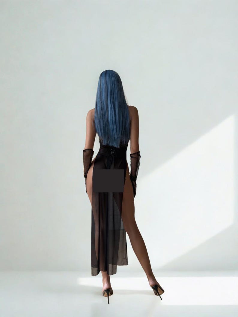 May include: A person with long blue hair is seen from the back, wearing a black dress with a high slit and sheer overlay. The outfit includes sheer gloves and high-heeled shoes. The background is a plain white wall.