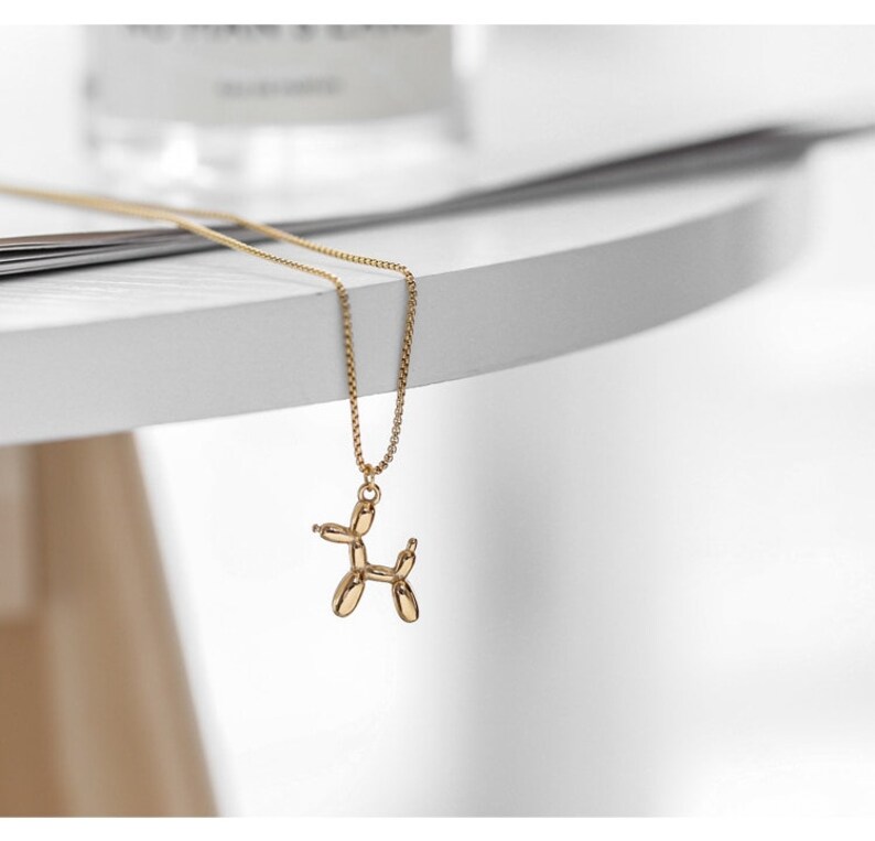 Gold balloon dog necklace Clearance