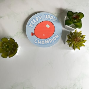 Keepy Uppy Champion Sticker: Waterproof Glossy Decal