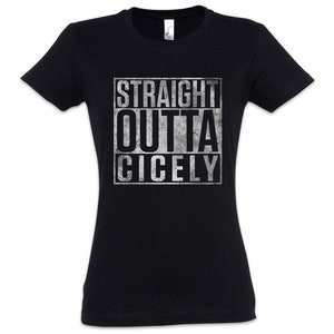 May include: Black t-shirt featuring the text "STRAIGHT OUTTA CICELY" in a distressed, rectangular design. The text is in a bold, sans-serif font, with a weathered, textured appearance. The shirt has short sleeves and a crew neck.