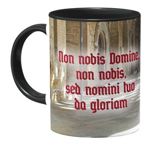 May include: Black and white mug with a photo of a stone hallway and the Latin phrase "non nobis Domine, non nobis, sed nomini tuo da gloriam" in red.