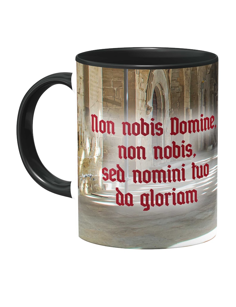 May include: Black and white mug with a photo of a stone hallway and the Latin phrase "non nobis Domine, non nobis, sed nomini tuo da gloriam" in red.