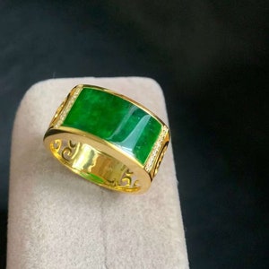 Jade ring 18K yellow gold Beautiful natural green jadeite in 18K yellow gold setting.