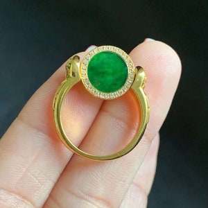 Jade ring 18K yellow gold Beautiful natural green jadeite in 18K yellow gold setting.
