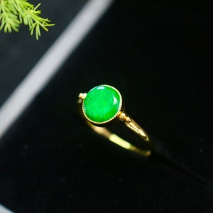 Vibrant apple green jade ring natural jadeite turnable band 18k yellow gold with certificate