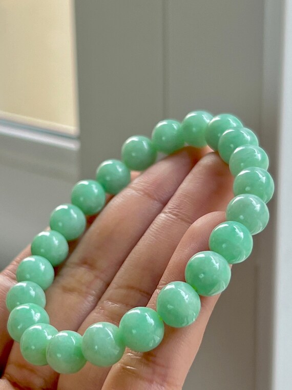 Green jade shop bead bracelet