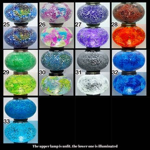 May include: A set of 10 mosaic glass lamps with a top and bottom bulb. The top bulb is unlit, and the bottom bulb is lit. The lamps are numbered 25 through 33.