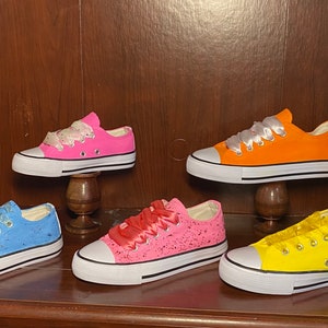 cream colored canvas shoes