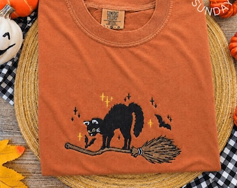 Embroidered Black Cat Broomstick Comfort colors Shirt, Fall Cat Tee, Cat Halloween Shirt , Cat Lover Halloween Shirt