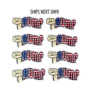 May include: Eight stickers with a raised fist holding an American flag with the word "TRUMP" written in white letters.