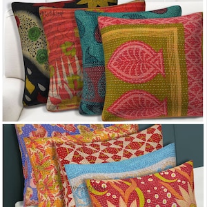 Könnte beinhalten: Ein Set aus sechs bunten Kantha-Wurfkissen mit verschiedenen floralen und geometrischen Mustern. Die Kissen sind aus Baumwolle und haben eine handgenähte Optik. Die Kissen sind perfekt, um jedem Raum einen Hauch von Boho-Stil zu verleihen.