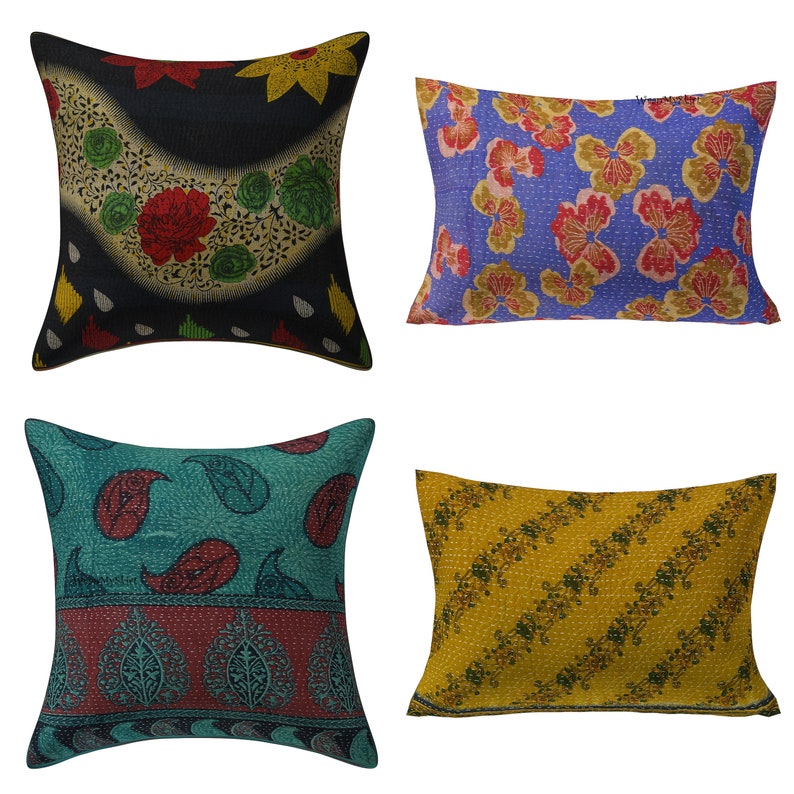 May include: Set of four decorative throw pillows with various floral and paisley patterns. The pillows are made of kantha fabric, a traditional Indian textile. The pillows are in shades of blue, green, yellow, and black.