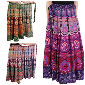 May include: Three long, colorful wrap skirts with a mandala pattern. The skirts are made of cotton and have a tie closure. The skirts are available in green, purple, and blue.