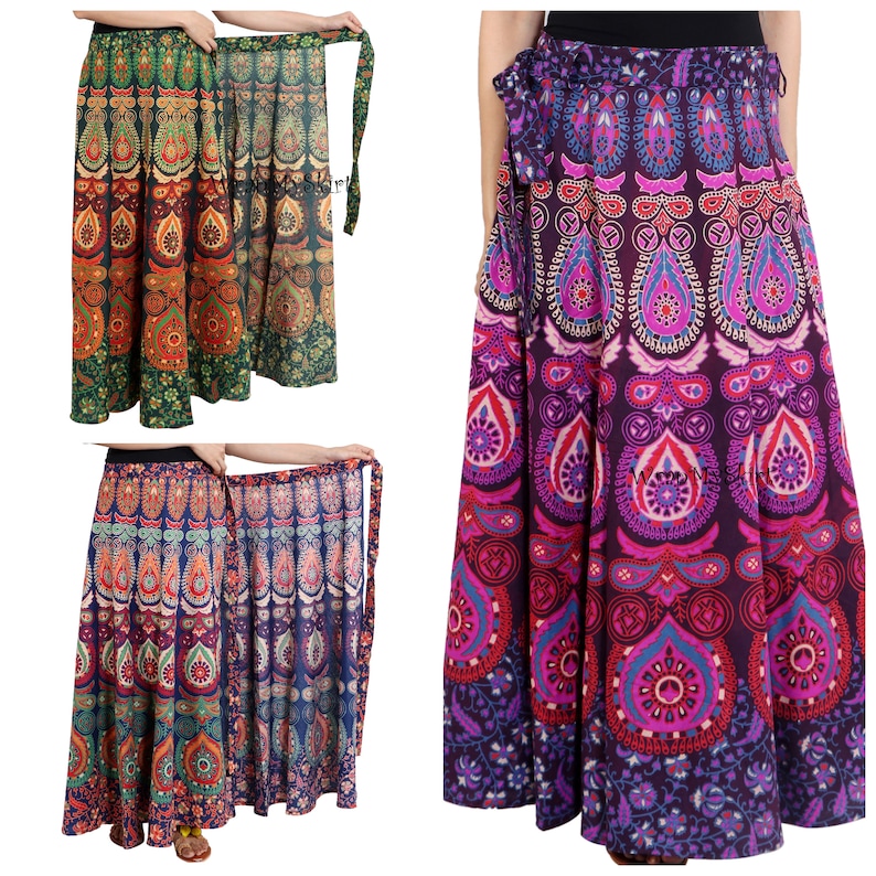 May include: Three long, colorful wrap skirts with a mandala pattern. The skirts are made of cotton and have a tie closure. The skirts are available in green, purple, and blue.