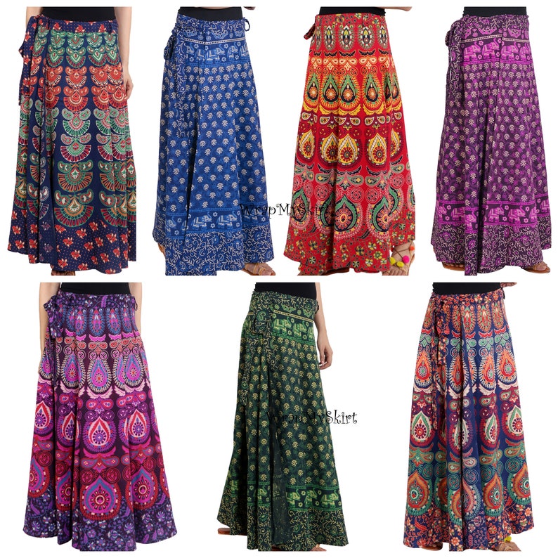 May include: A set of six long, colorful wrap skirts with various patterns. The skirts are made of cotton and have a tie closure at the waist.
