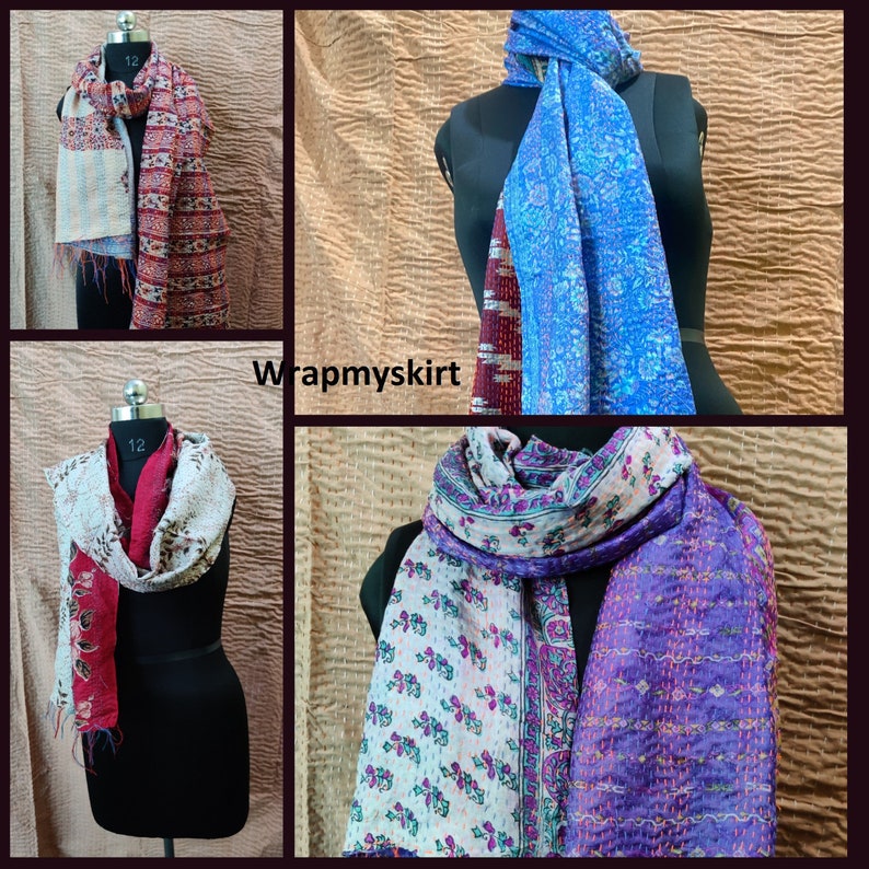 May include: Four different silk scarves with various patterns and colors. The scarves are made of kantha stitching, a traditional Indian embroidery technique. The scarves are displayed on mannequins.